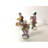 A group of three early 20thc German china figure of Musicians, stamped S under crown with other