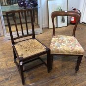 A Victorian oak side chair with balloon back above a later floral upholstered seat on front turned
