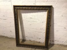 A gilt composition picture frame (103cm x 75cm)