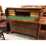 A 19thc mahogany secretaire with two fall front dummy drawers to top above an arrangement of drawers