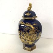 An Edwardian Carltonware lidded jar, with blue ground and gilt Chinese inspired decoration, with