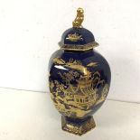 An Edwardian Carltonware lidded jar, with blue ground and gilt Chinese inspired decoration, with