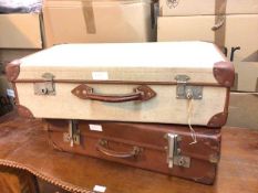 A vintage travelling case with canvas interior, unopened (43cm x 72cm x 19cm), and another (2)