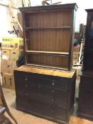 A Victorian chest of drawers formerly with superstructure, fitted two short drawers above three