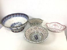 An early 20thc large footed bowl with Chinese inspired decoration, staple repairs (15cm x 33cm), a