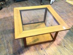 A 1960's - 70's teak vintage square coffee table with central glass top with matching quarter