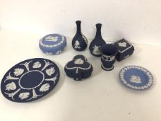 A collection of Wedgwood jasparware including two bud vases (each: 13cm), lidded trinket dishes, a