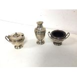 A 1990s Sheffield silver pepperette of classical form and an urn shaped salt and condiment pot (