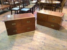 A pair Chinese cherrywood modern campaign style low chests, each with two short drawers above a