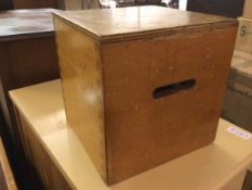 A pine utility cube with handles to sides and open to base (25cm x 25cm x 25cm)