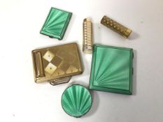 A 1920s/30s Birmingham silver cigarette case with mint green guilloche exterior and a matching