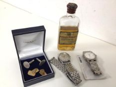 A pair of 9ct gold cufflinks (5.05g) and a pair of silver cufflinks, a Tissot wristwatch, a Seiko