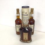 Three bottles of Metaxa including two 12 Star bottles and a Metaxa reserve in decanter (3)