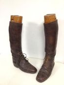 A pair of vintage brown leather boots with wooden boot trees: (single boot : 45.5cm x 28cm x 9cm )