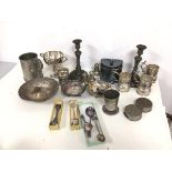 An assortment of Epns and metalware including dishes, pepperettes, trophy, a pair of pewter