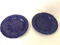 A pair of 19thc blue majolica leaf pattern plates, some losses (21cm)