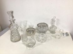 A collection of cut glass and crystal including thistle inspired decanter (33cm), two flower