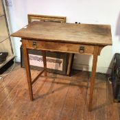 An Arts & Crafts style side table, fitted single frieze drawer with ring handles, on tapering square