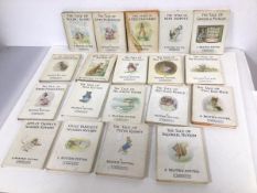 A collection of Beatrix Potter children's books including The Tale of Peter Rabbit, Appley Dapply'
