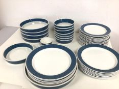 A Finish Arabia dinner service including six dinner plates (26cm), eight lunch plates, side