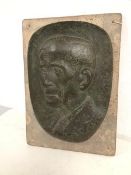 A bronze portrait plaque mounted on stone, possibly Joseph Bell, Friend of Sir Arthur Conan Doyle