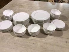 A John Lewis bone china forty eight piece dinner service in white with silvered border, including