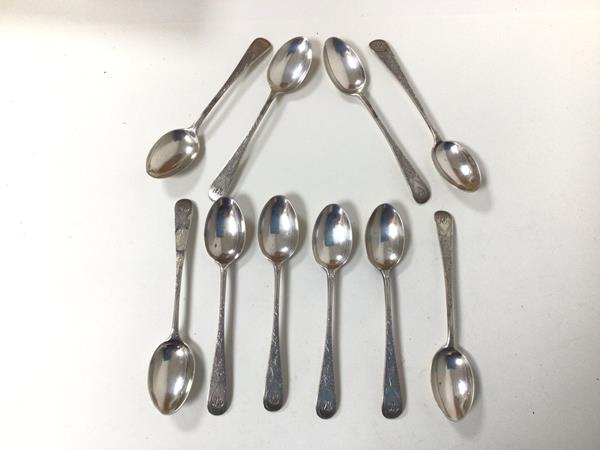 A set of ten 1900 Sheffield silver coffee spoons, with foliate decoration to stems and monogram (