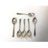 A set of six 1891 London silver coffee spoons, each with a shell bowl (combined: 57.65g)