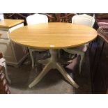 A Laura Ashley circular dining table with oak top on painted pedestal base (78cm x 120cm)
