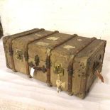 A pigskin bound trunk, c.1900, complete with key and miscellaneous labels etc., with carry handles