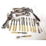 An assortment of Epns including soup spoons, table spoons, forks, knives, fish knives etc. (a lot)