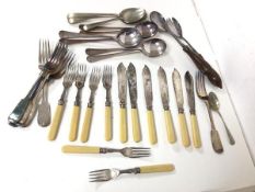 An assortment of Epns including soup spoons, table spoons, forks, knives, fish knives etc. (a lot)