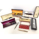 A collection of pens including Parker, Cross, Platignum, Sheaffer etc.