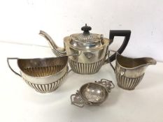 A matched silver batchelor's tea service including teapot, milk jug and sugar bowl, all with half