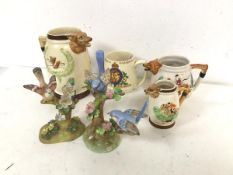 A novelty jug depicting a Fox Hunt (16cm), and two other similar jugs, a George VI and Queen