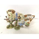 A novelty jug depicting a Fox Hunt (16cm), and two other similar jugs, a George VI and Queen