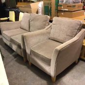 A modern two piece lounge suite comprising a two seater sofa and easy chair in fawn plush fabric