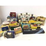 A large collection of toy cars, all in original boxes, including Dinky, Corgi, Castle House,