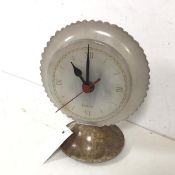 A Herna table clock, the dial and base composed of carved marble, with battery powered movement (