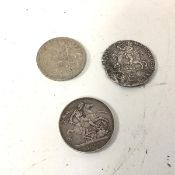 An 1893 silver crown, a 1935 crown and a shipwreck coin in the style of a Dutch Batavian Republic