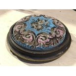 A Victorian ebonised and brass mounted circular beaded top footstool raised on bun feet (6cm x d.