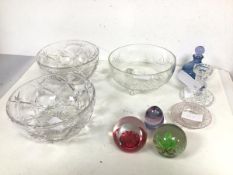 A collection of glassware including two Caithness glass paperweights, one unmarked paperweight,