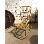 A 1970s Italian cane rocking chair (116cm x 58cm x 90cm)