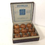 A set of 1920s German Archimedes mathematical toys, each in the form of a wooden articulated apples,