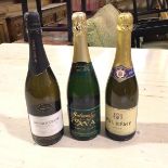 A bottle of Pol Remy Brut Mousseux, a bottle of dry Cava and a Jacobs Creek Chardonnay Pinot Noir
