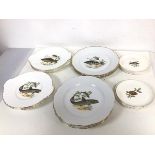 A set of six plates by various makers, all depicting Fish (24cm), six handled plates with Fish