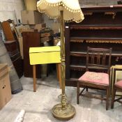 A gilded and marbled finish fluted floor lamp and shade raised on circular moulded base (154cm base: