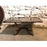 A Strongbow Furniture Georgian style mahogany drop leaf coffee table, on downswept supports ending