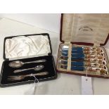 A presentation set of London silver utensils including fork and two spoons, in original Edward &