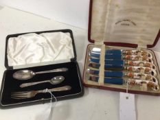 A presentation set of London silver utensils including fork and two spoons, in original Edward &